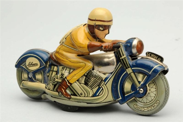 GERMAN SCHUCO TIN LITHO WIND-UP MOTORCYCLE TOY.   