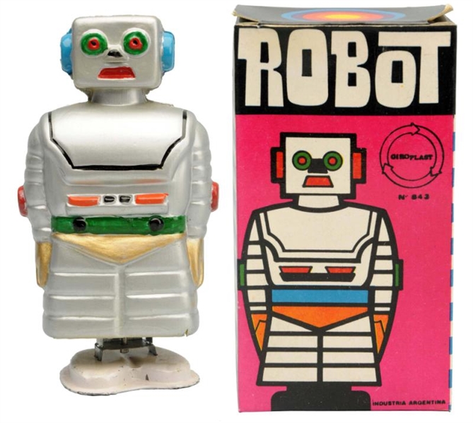 HEAVY CELLULOID WIND-UP ROBOT.                    