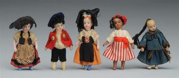 LOT OF 5: SMALL FRENCH DOLLS.                     
