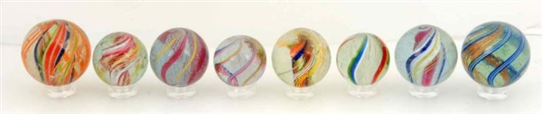 LOT OF 8: SWIRL MARBLES.                          