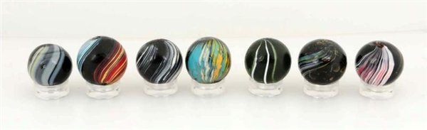 LOT OF 7: INDIAN SWIRL MARBLES.                   