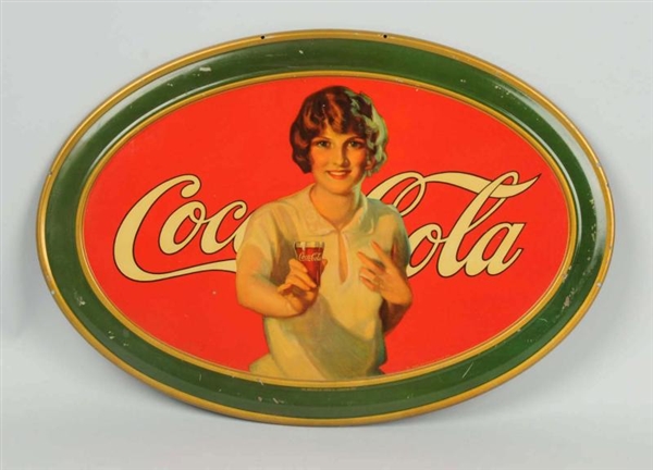 1926 LARGE EMBOSSED TIN OVAL SIGN.                