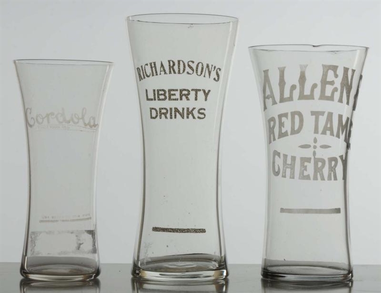 LOT OF 3: ADVERTISING GLASSES.                    