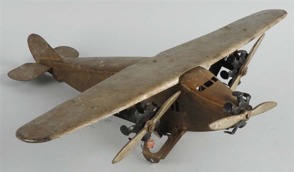 PRESSED STEEL STEELCRAFT TRIMOTOR AIRPLANE TOY.   
