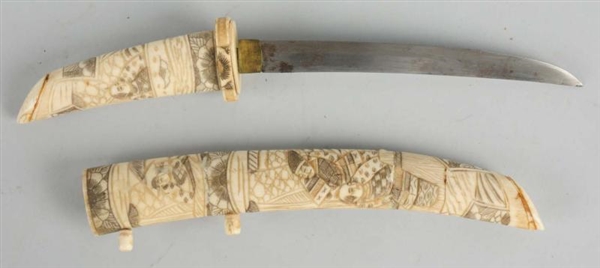 ORIENTAL CARVED BONE KNIFE.                       