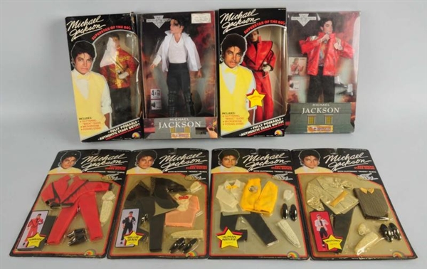 LOT OF 8: MICHAEL JACKSON DOLLS & STAGE OUTFITS.  
