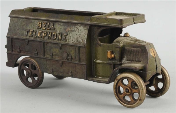 CAST IRON HUBLEY BELL TELEPHONE TOY TRUCK.        