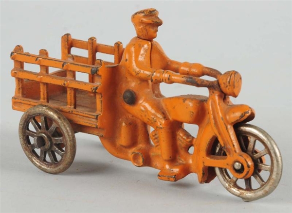CAST IRON HUBLEY STAKEBACK MOTORCYCLE TOY.        