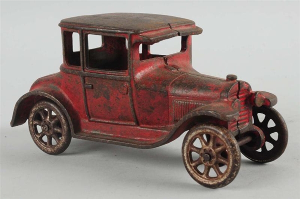 CAST IRON ARCADE COUPE AUTO.                      