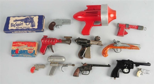 LOT OF 11 MISC. TOY GUNS.                         