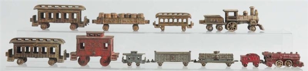 LOT OF EARLY CAST IRON AMERICAN FLOOR TRAINS.     
