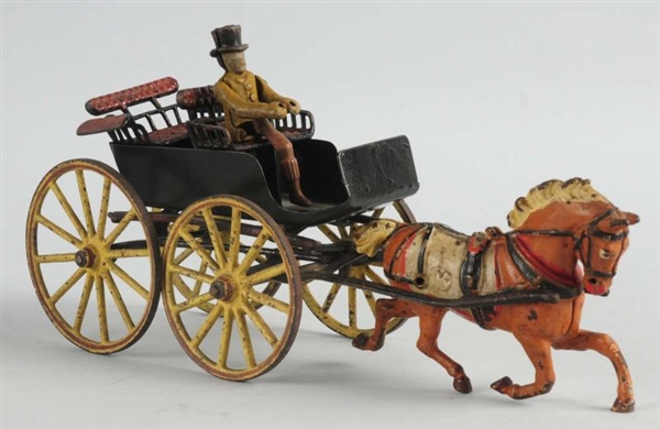CAST IRON AMERICAN MADE HORSE-DRAWN SURREY TOY.   
