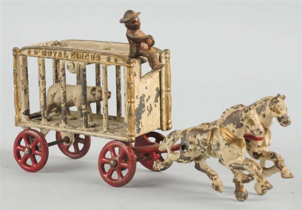 CAST IRON HUBLEY HORSE-DRAWN WORLD CIRCUS WAGON.  