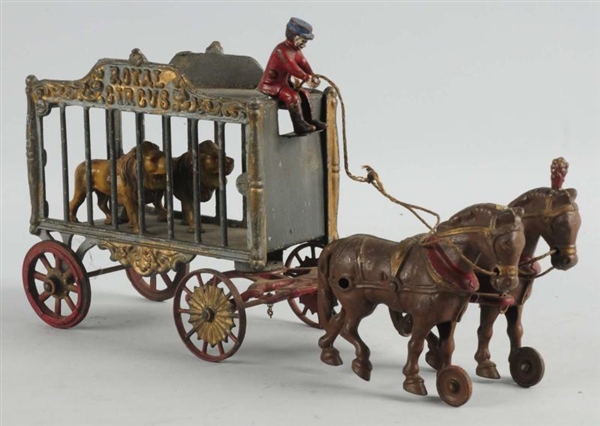 CAST IRON HORSE-DRAWN HUBLEY ROYAL CIRCUS WAGON.  