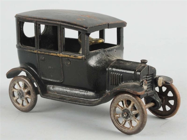 CAST IRON ARCADE SEDAN.                           