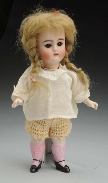 CHUNKY ALL BISQUE DOLL.                           