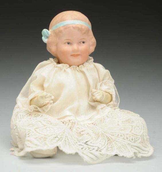 SMILING HEUBACH “COQUETTE” DOLL.                  