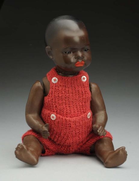 BLACK BISQUE CHARACTER DOLL.                      