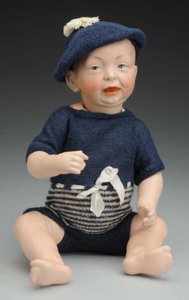 SMILING K & R CHARACTER BABY DOLL.                