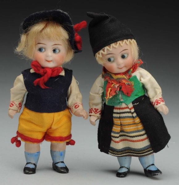 PAIR OF ALL-BISQUE GOOGLY DOLLS.                  
