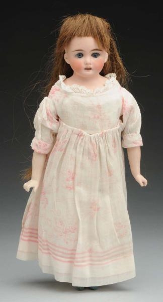 WINSOME KLING CHILD DOLL.                         