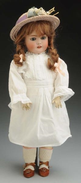 CLASSIC S & H CHILD DOLL.                         