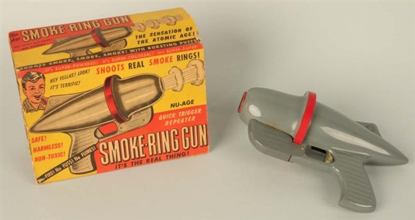 VINTAGE AMERICAN MADE SMOKE RING GUN.             