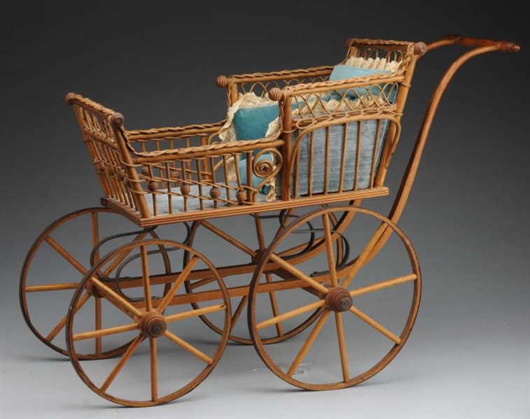 VICTORIAN WICKER DOLL CARRIAGE.                   