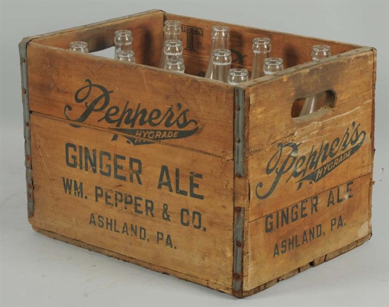 CASE OF PEPPER SODA BOTTLES.                      