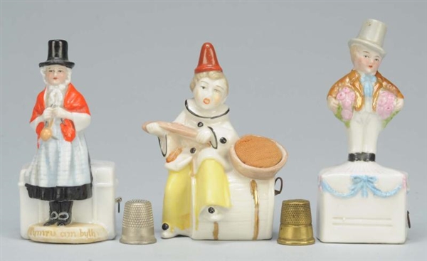 LOT OF 3: PORCELAIN FIGURAL SEWING TAPE MEASURES. 