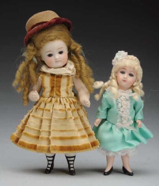 LOT OF 2: ALL-BISQUE DOLLS.                       