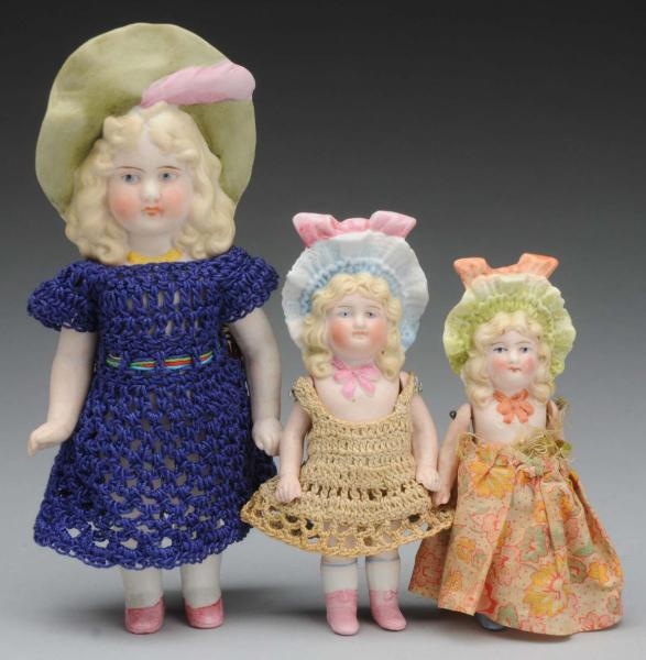 LOT OF 3: ALL-BISQUE DOLLS.                       