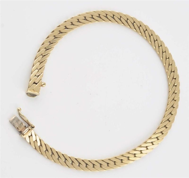 14K YG BRACELET.                                  