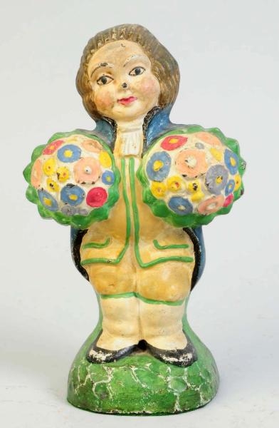 CAST IRON COLONIAL MAN WITH BOUQUETS DOORSTOP.    