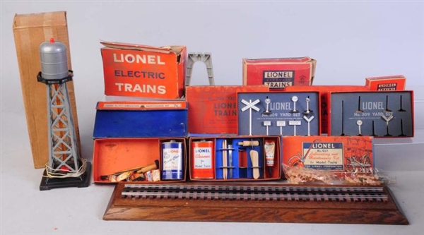 LIONEL ASSORTMENT OF ACCESSORIES & MARX TOWER.    