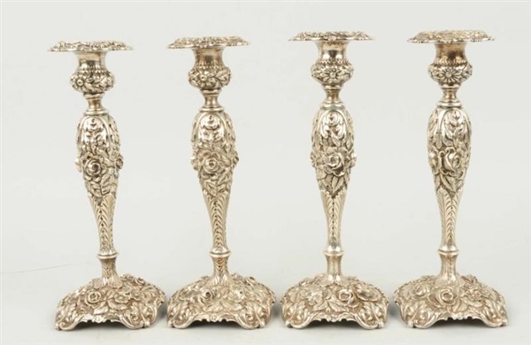 LOT OF 4: REPOUSSE STERLING TABLE CANDLESTICKS.   