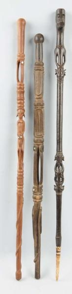LOT OF 3: WOODEN WALKING STICKS/CANES.            
