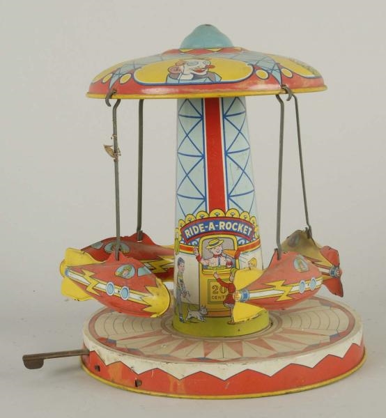 CHEIN TIN WIND-UP CARNIVAL ROCKET RIDE TOY.       
