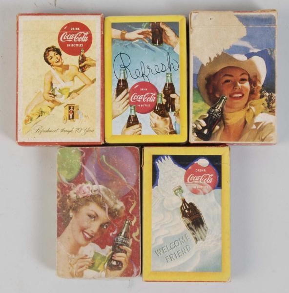 LOT OF 5: DECKS OF COCA-COLA PLAYING CARDS.       