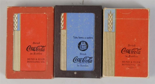LOT OF 3: DECKS OF COCA-COLA PLAYING CARDS.       