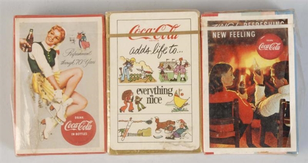 LOT OF 3: DECKS OF COCA-COLA PLAYING CARDS.       