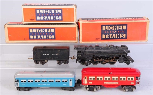 LIONEL NO.1666 LOCOMOTIVE, TENDER & CARS.         