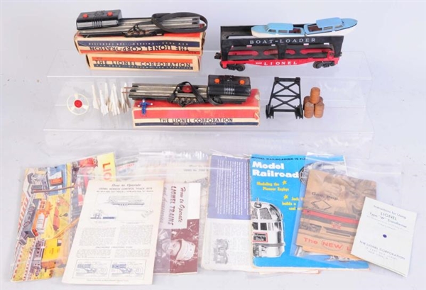 LIONEL NO.6416 BOAT LOADER & USEFUL ITEMS.        