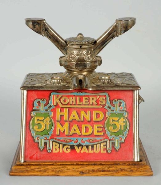 CIGAR CUTTER WITH KOHLERS ADVERTISING.           