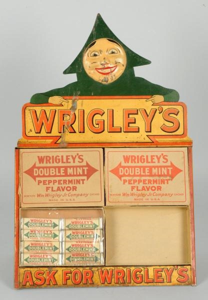 WRIGLEY MAN WITH 4 BOXES.                         
