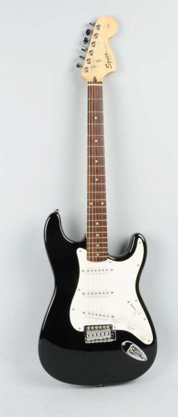 FENDER SQUIRE ELECTRIC GUITAR WITH CASE.          