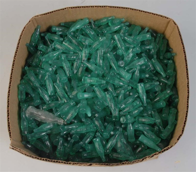 LARGE LOT OF SMALL GREEN COCA-COLA BOTTLES.       