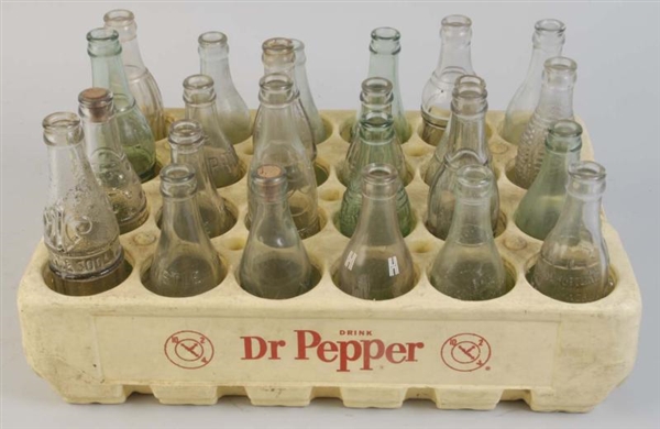 DR. PEPPER PLASTIC CASE WITH BOTTLES.             