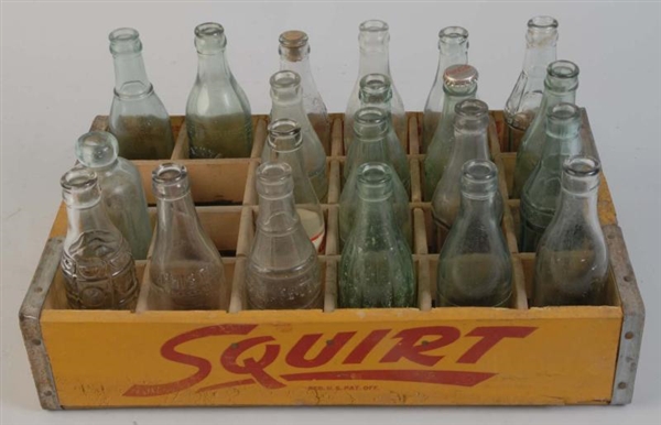 SQUIRT CARRIER WITH BOTTLES.                      