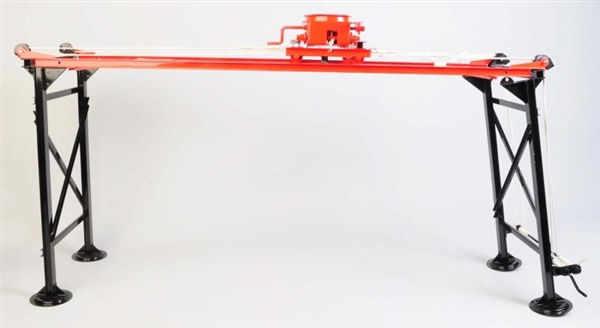 PRESSED STEEL ARIAL CRANE TOY.                    